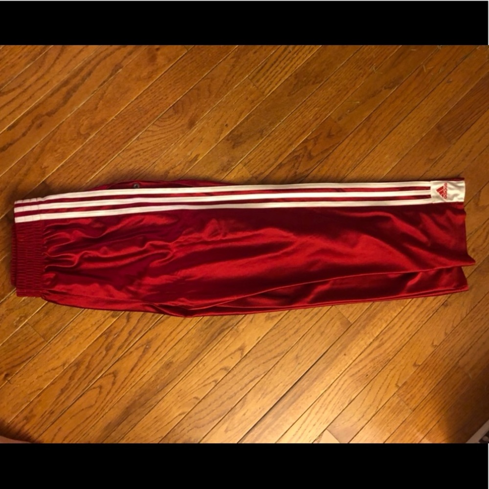 Adidas gym pants, buttons all down the leg